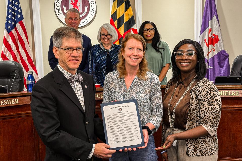 Employees of For All Seasons receives proclamation for Sexual Assault Awareness Month in April 2025.