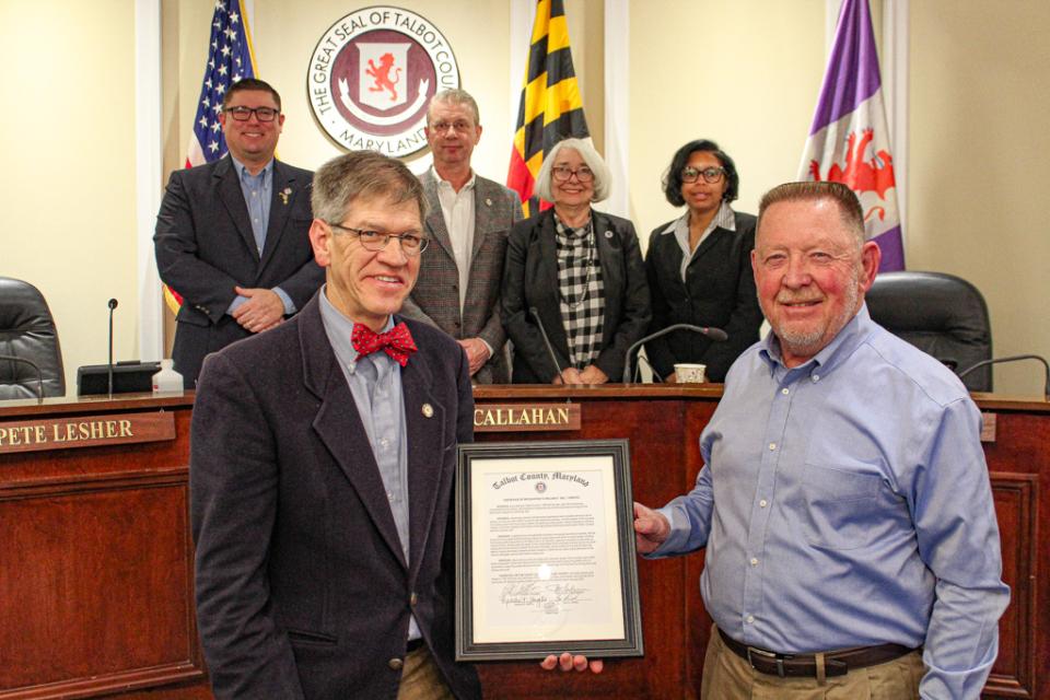 Council Vice President Pete Lesher presents William “Bill” H. Shrieves with a Certificate of Recognition from the County.