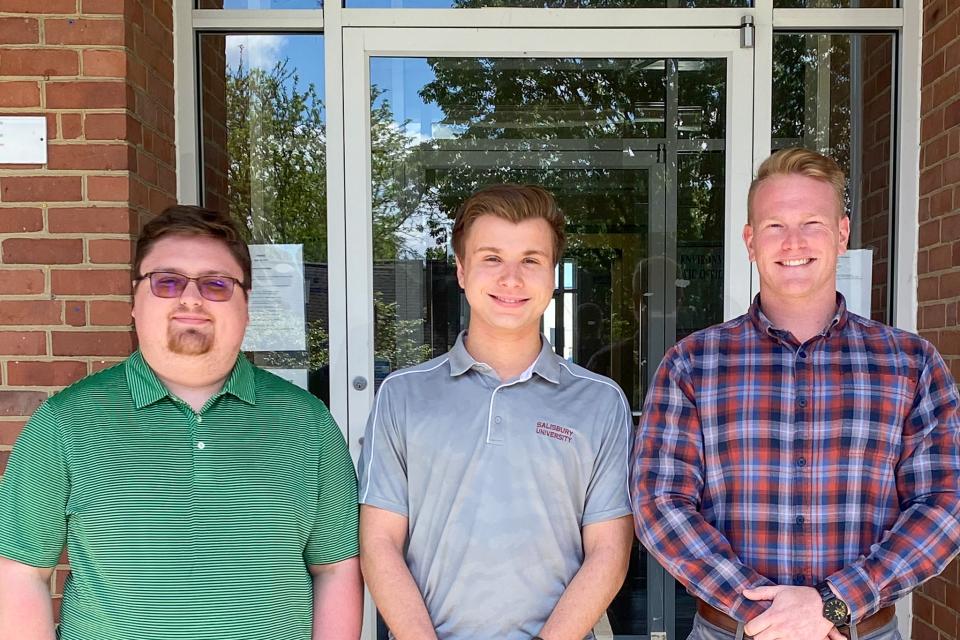 Salisbury University Student Erik Moseley (middle) stands with Planning and Zoning staff. Moseley just wrapped up a 135-hour internship with the County.