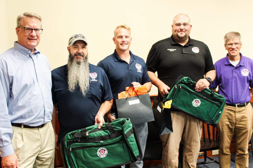 Department of Planning and Zoning. From left: County Manager Clay Stamp, Jimmy Mullikin (15 yrs), Brennan Tarleton (5 yrs), Duane Gottschalk (5 yrs), Council Vice President Pete Lesher