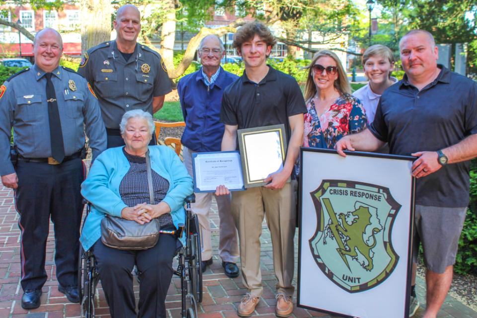 Blake Newton joined his family, Easton Police Department Chief Alan Lowery, and Talbot County Sheriff Joe Gamble.