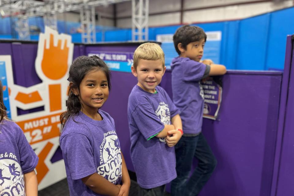 Campers happily wait in line on field trip at Talbot County Parks and Recreation Summer Camp