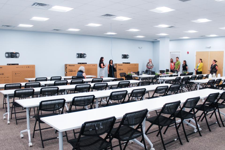 Council tours new large meeting space, which can be set up for trainings, health fairs, or more.