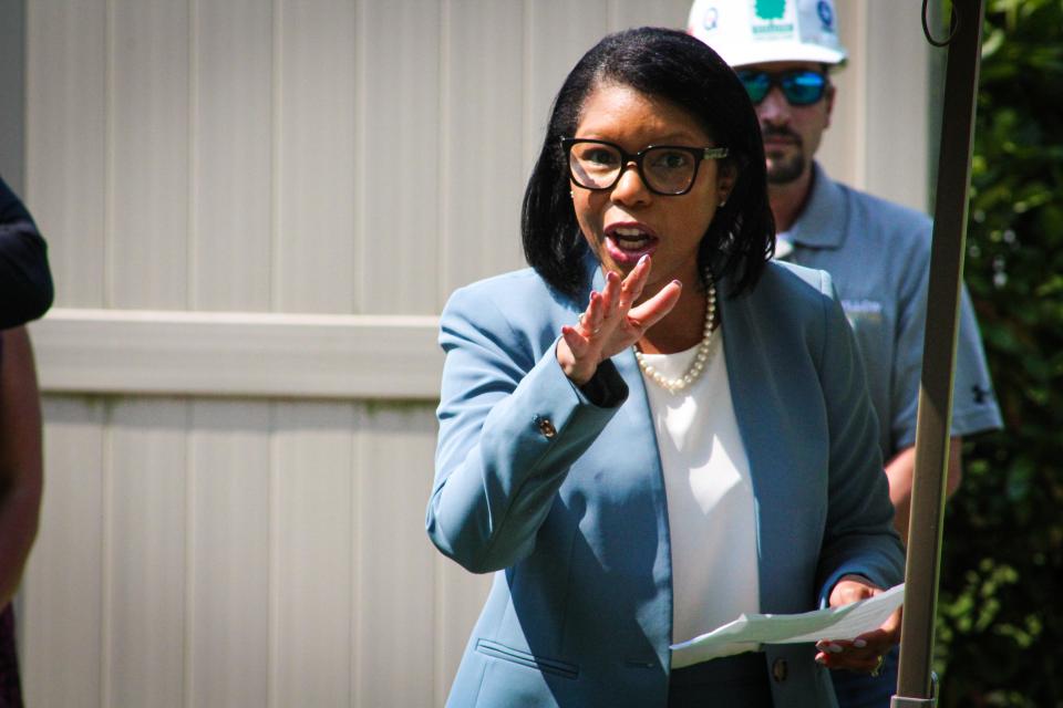 Council Member Keasha Haythe highlights the impact of the food pantry and financial assistance that SVDP provides to community.