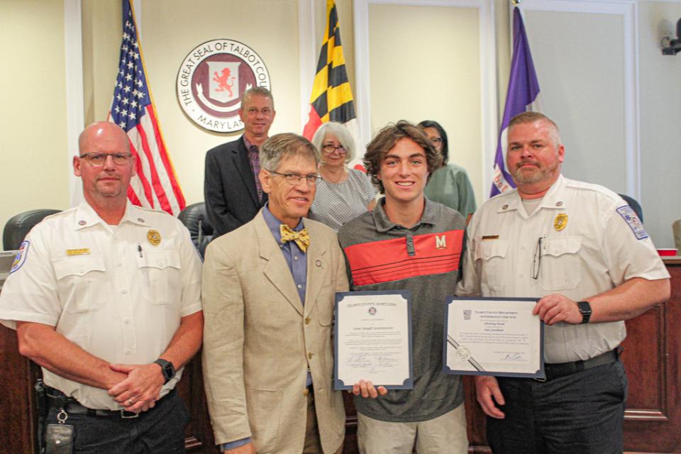 From left: Matt Watkins, Division Chief, Council Vice President Pete Lesher, Sean Gunshenan, and Brian LeCates, Director of Emergency Services