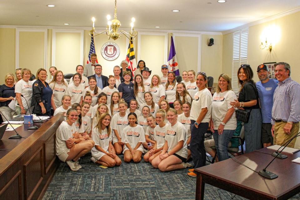 Members of “Elgin’s Army” take a picture with the Council after Elgin’s presentation on her “Make a Wish” request for an artificial turf field.