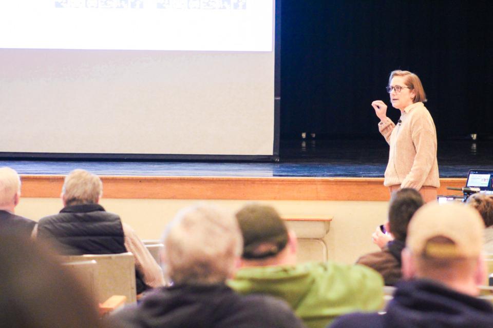 Jennifer Anders, MD, Associate State EMS Medical Director for Pediatrics (MIEMSS), discusses the Trauma Decision Tree with EMS clinicians in the Easton High School Auditorium.