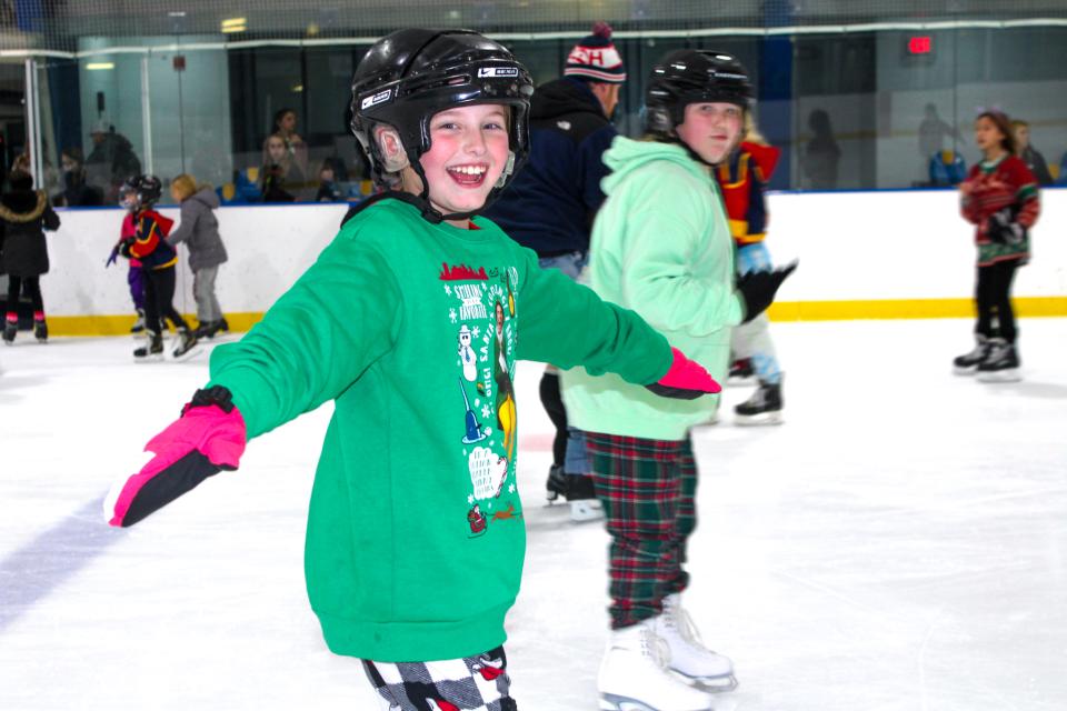 Young skater poses for the camera during the Skate with Santa event on December 4, 2024.