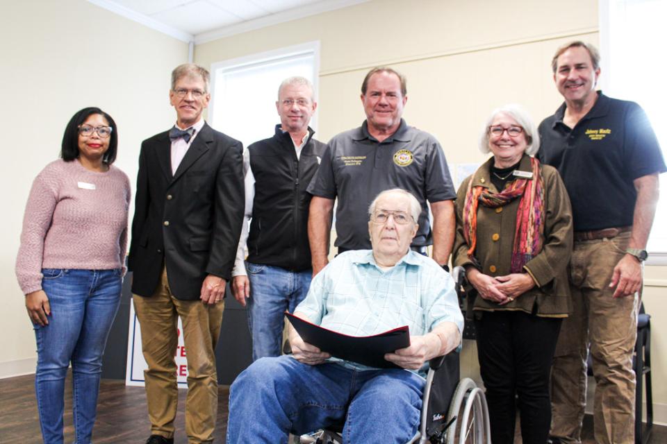 From left to right: Council Member Keasha Haythe, Council Vice President Pete Lesher, Council President Chuck Callahan, D37B Delegate Tom Hutchinson, Joe Secrist (front), Council Member Lynn Mielke, and D37 Senator Johnny Mautz.