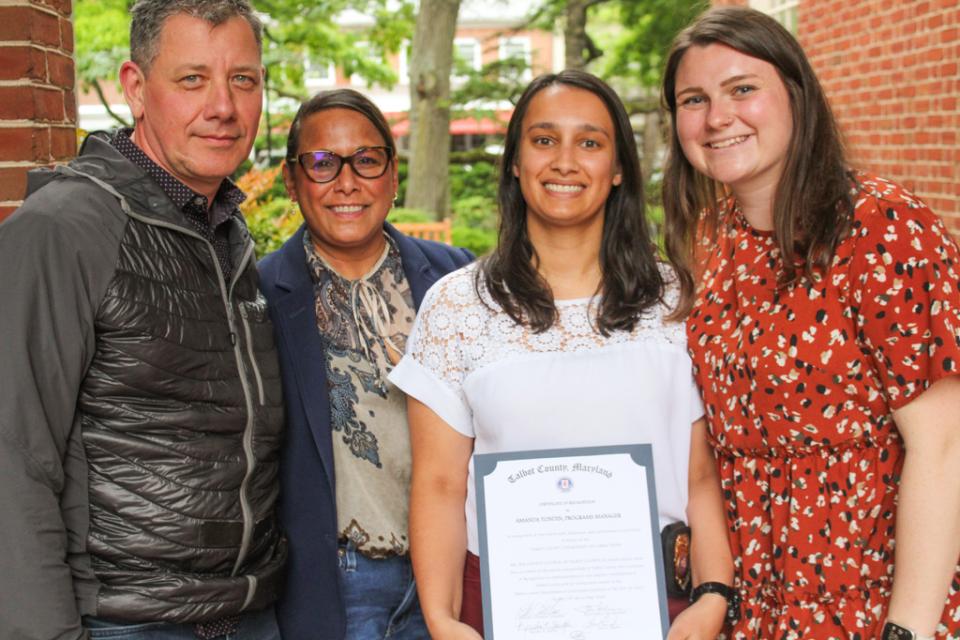 Amanda Tondin celebrates &quot;Employee of the Year&quot; recognition with family members